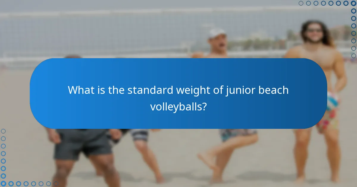 What is the standard weight of junior beach volleyballs?